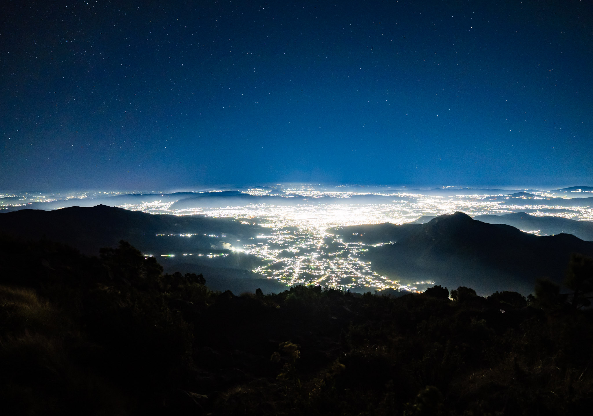 Xela at night from Santa María’s summit on a camping tour.