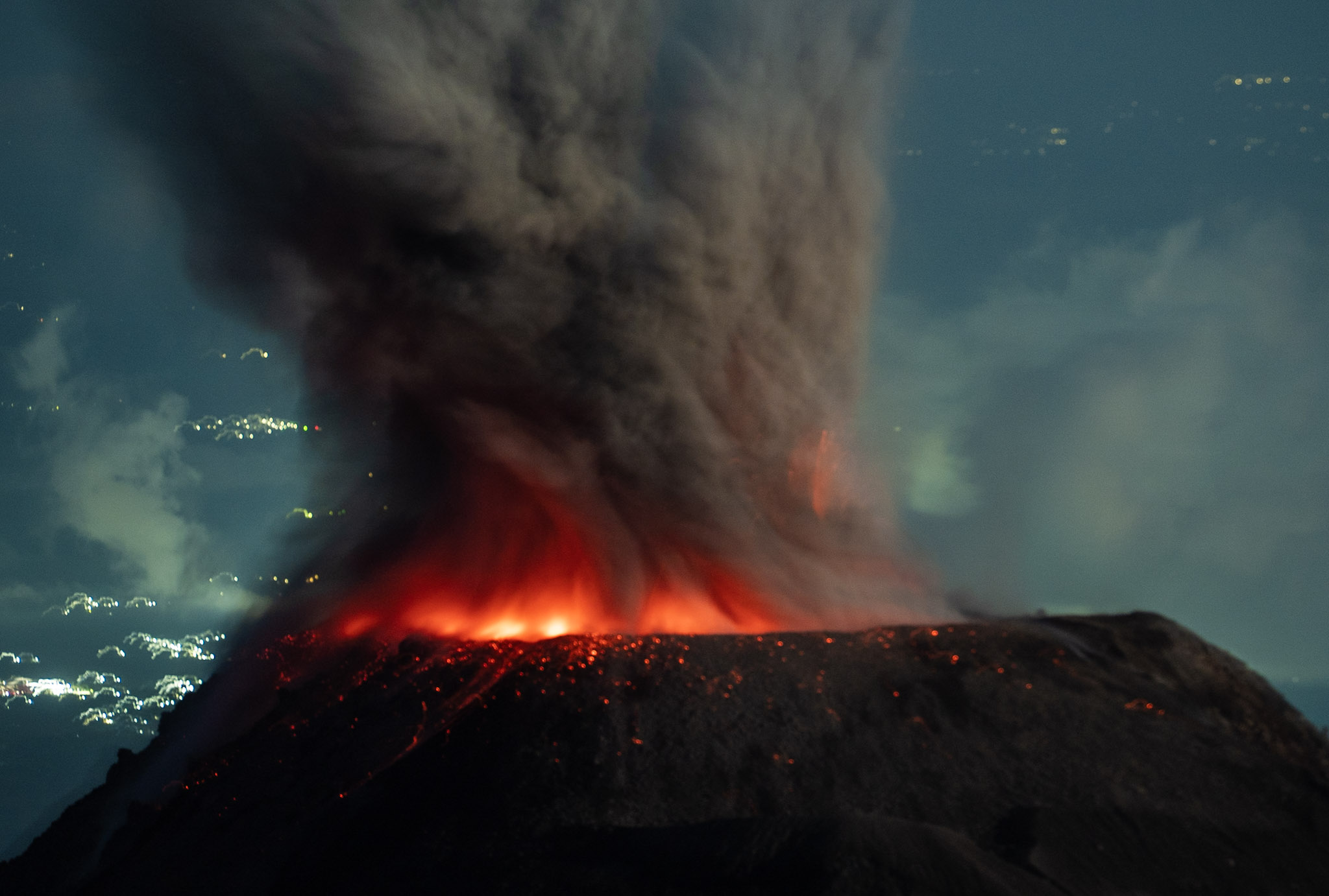 Santiaguito erupting before sunrise from the Mirador.