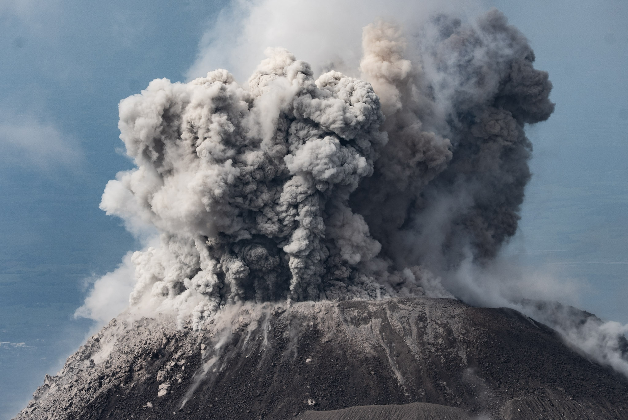 The full active Santiaguito cone showing its raw power.