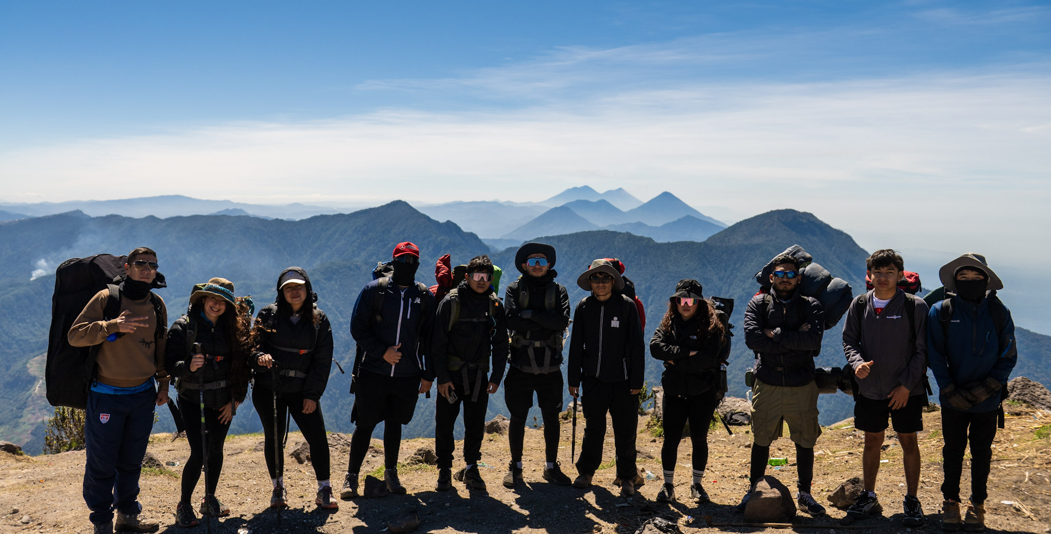 Our group celebrating the climb at the top of Volcán Santa María.