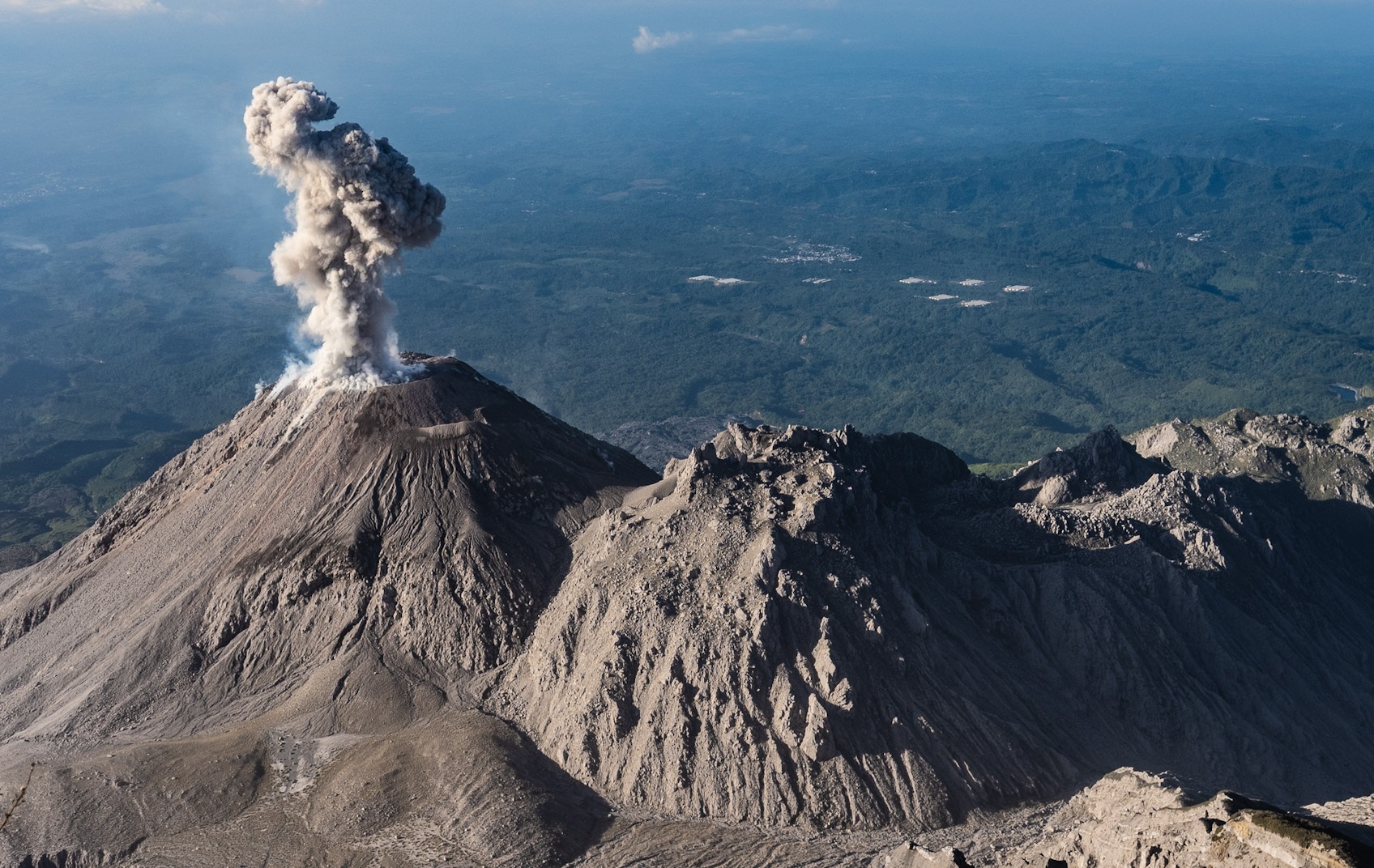 Gas vortexes and ash plume